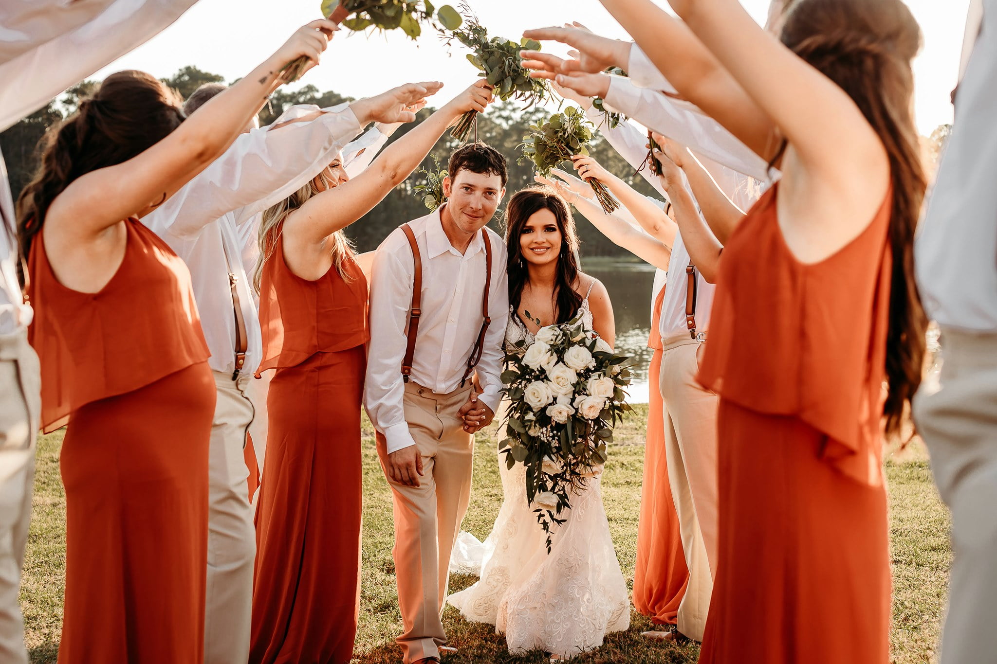 bride and groom walking hand in hand