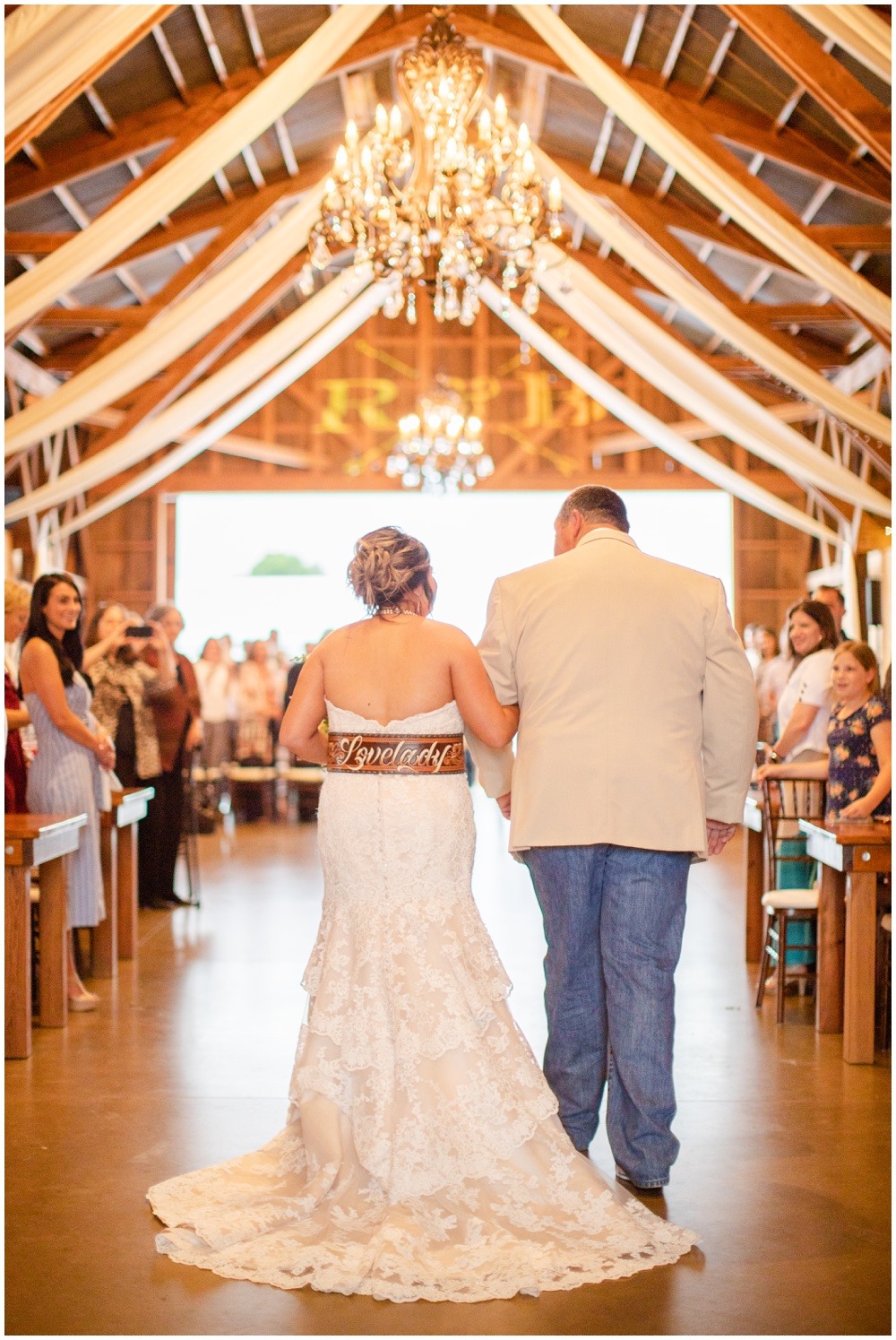 Father walking bride down the aisle